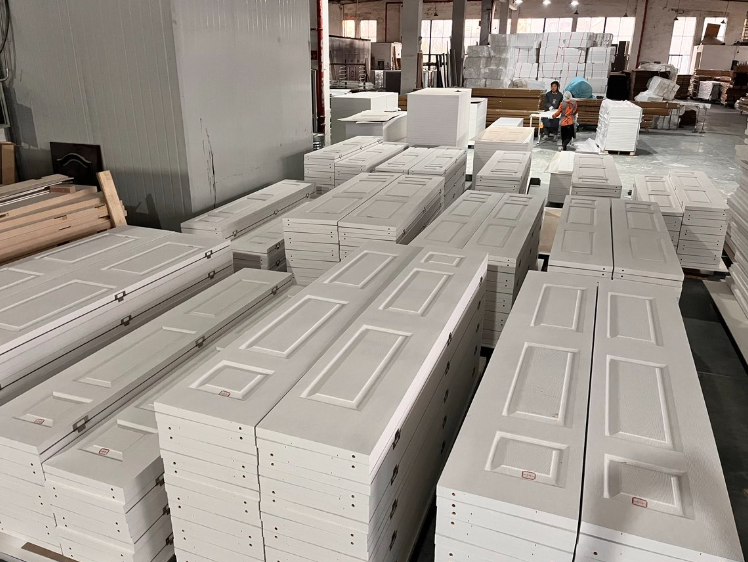Mass production of white primed shaker door slabs at UWG's 32-acre manufacturing facility