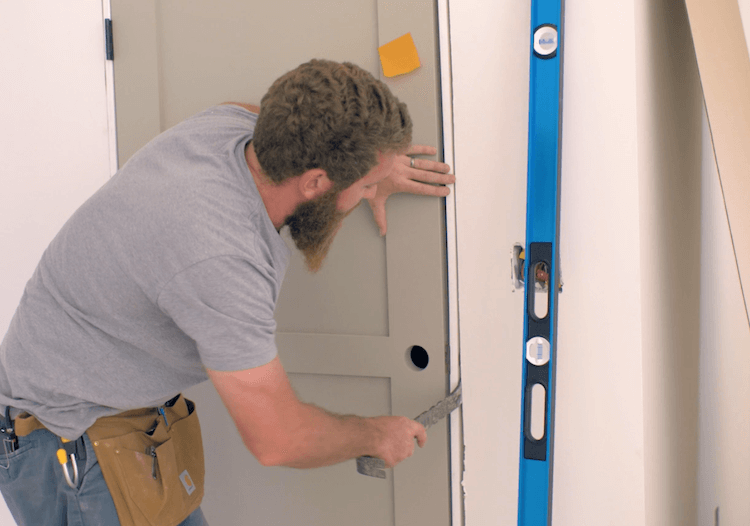 Workers are installing doors