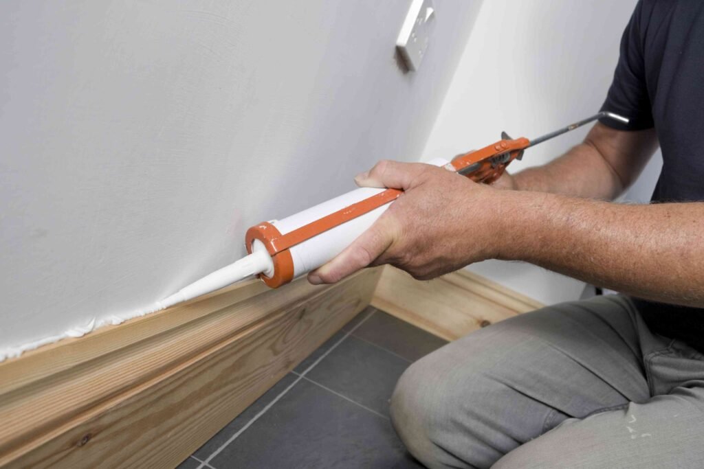 How to Fill Gaps Between Floor and Wall Trim