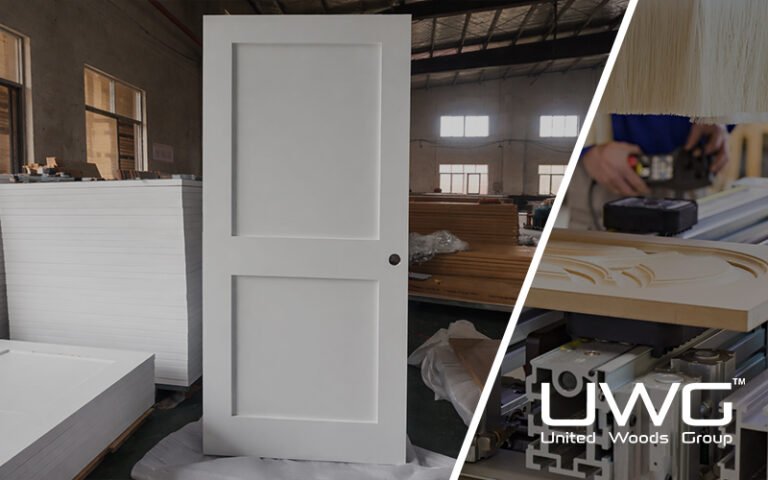 Primed two panel interior door displayed inside a door manufacturing factory