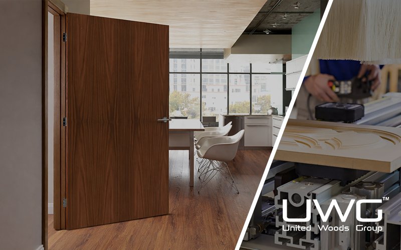 Modern interior with a wooden flush door opening into a bright kitchen and dining area