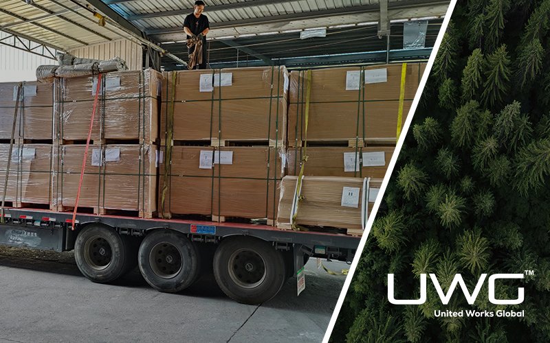 Building material packages loaded on a flatbed truck inside a warehouse