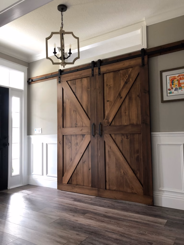 Rustic K-frame barn door for farmhouse interior