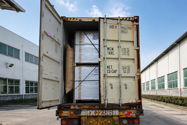 Palletized vinyl windows loaded inside a shipping container