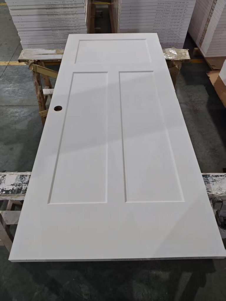 T-style 3-panel Shaker-style molded door in a factory