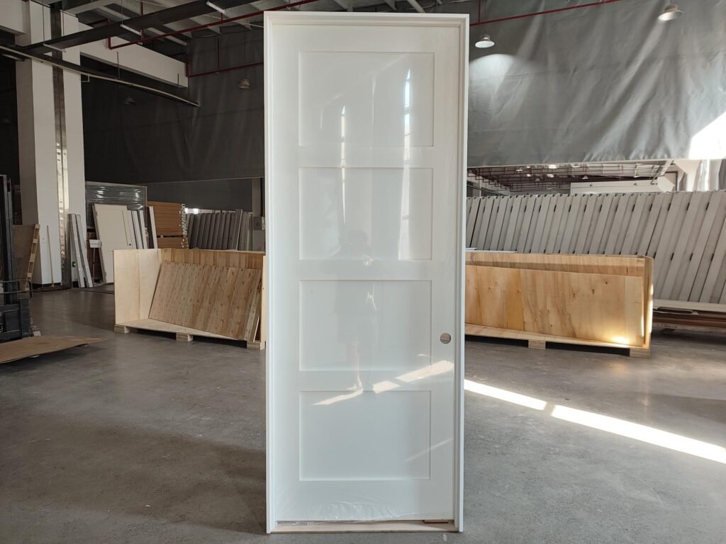 Prehung interior door frame showing slab, jamb, and hinges
